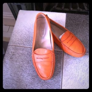TOD’S orange driving loafers